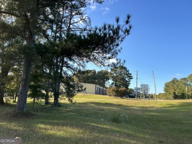 Unique opportunity with abundant possibilities! Attractive on Uncle Remus Golf Course in Georgia - for sale on GolfHomes.com, golf home, golf lot