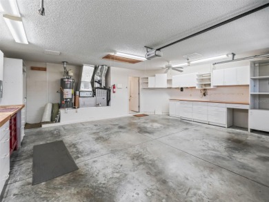 One or more photo(s) has been virtually staged. CUSTOM Magnolia on El Santiago Executive Golf Course in Florida - for sale on GolfHomes.com, golf home, golf lot