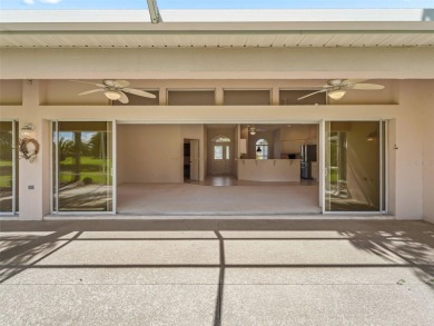 One or more photo(s) has been virtually staged. CUSTOM Magnolia on El Santiago Executive Golf Course in Florida - for sale on GolfHomes.com, golf home, golf lot