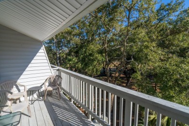 Discover this beautifully appointed upper-level Driftwood condo on The Plantation Course At Edisto in South Carolina - for sale on GolfHomes.com, golf home, golf lot