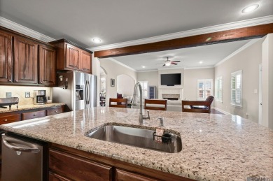 Welcome to 59685 Avery James Drive! This stunning 4-bedroom on The Island Country Club in Louisiana - for sale on GolfHomes.com, golf home, golf lot