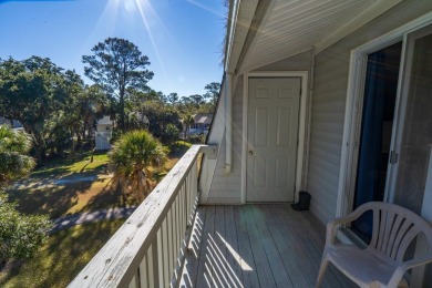 Discover this beautifully appointed upper-level Driftwood condo on The Plantation Course At Edisto in South Carolina - for sale on GolfHomes.com, golf home, golf lot