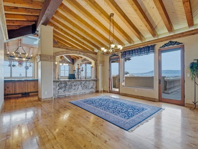 Spectacular Old World Tuscan-Inspired Estate in Redlands Mesa on The Golf Club At Redlands Mesa in Colorado - for sale on GolfHomes.com, golf home, golf lot