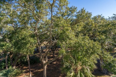 Discover this beautifully appointed upper-level Driftwood condo on The Plantation Course At Edisto in South Carolina - for sale on GolfHomes.com, golf home, golf lot