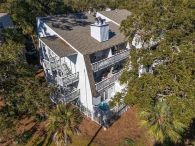 Discover this beautifully appointed upper-level Driftwood condo on The Plantation Course At Edisto in South Carolina - for sale on GolfHomes.com, golf home, golf lot