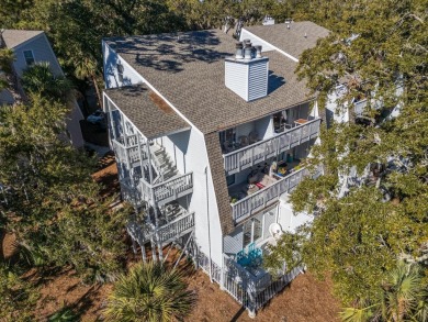 Discover this beautifully appointed upper-level Driftwood condo on The Plantation Course At Edisto in South Carolina - for sale on GolfHomes.com, golf home, golf lot