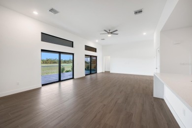 This exceptional new construction home, built by ONX Homes, is on Burnt Store Golf Club in Florida - for sale on GolfHomes.com, golf home, golf lot