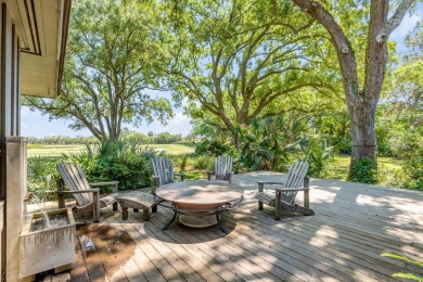 Nestled on the serene fifth green of the prestigious Charleston on Country Club of Charleston in South Carolina - for sale on GolfHomes.com, golf home, golf lot