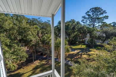 Discover this beautifully appointed upper-level Driftwood condo on The Plantation Course At Edisto in South Carolina - for sale on GolfHomes.com, golf home, golf lot