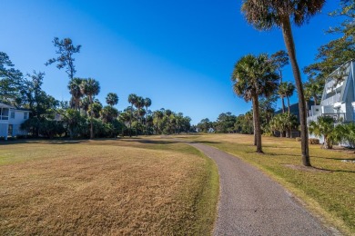 Discover this beautifully appointed upper-level Driftwood condo on The Plantation Course At Edisto in South Carolina - for sale on GolfHomes.com, golf home, golf lot
