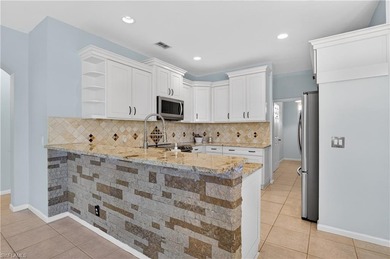 Experience stunning Florida sunrises in this beautifully updated on Fountain Lakes Community Golf Course in Florida - for sale on GolfHomes.com, golf home, golf lot