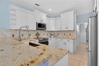 Experience stunning Florida sunrises in this beautifully updated on Fountain Lakes Community Golf Course in Florida - for sale on GolfHomes.com, golf home, golf lot