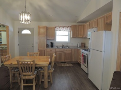 Just pack your bags and move right in to this immaculate totally on Nahma Club in Michigan - for sale on GolfHomes.com, golf home, golf lot