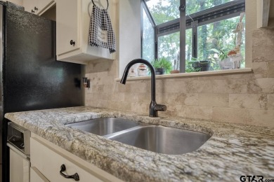 Welcome to your serene retreat in the beautiful, gated community on Hide-A-Way Lake Golf Course in Texas - for sale on GolfHomes.com, golf home, golf lot