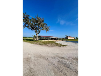 Country living at its finest on this half acre lot in this gated on Indian Lake Estates Golf and Country Club in Florida - for sale on GolfHomes.com, golf home, golf lot