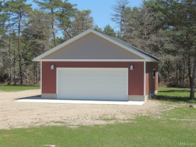 Just pack your bags and move right in to this immaculate totally on Nahma Club in Michigan - for sale on GolfHomes.com, golf home, golf lot