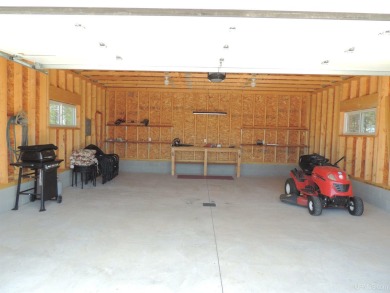 Just pack your bags and move right in to this immaculate totally on Nahma Club in Michigan - for sale on GolfHomes.com, golf home, golf lot