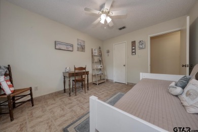 Welcome to your serene retreat in the beautiful, gated community on Hide-A-Way Lake Golf Course in Texas - for sale on GolfHomes.com, golf home, golf lot