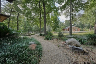 Welcome to your serene retreat in the beautiful, gated community on Hide-A-Way Lake Golf Course in Texas - for sale on GolfHomes.com, golf home, golf lot