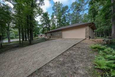 Welcome to your serene retreat in the beautiful, gated community on Hide-A-Way Lake Golf Course in Texas - for sale on GolfHomes.com, golf home, golf lot