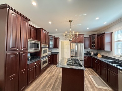 549 Old Augusta Drive is situated within Pawleys Plantation; a on Pawleys Plantation Golf and Country Club in South Carolina - for sale on GolfHomes.com, golf home, golf lot