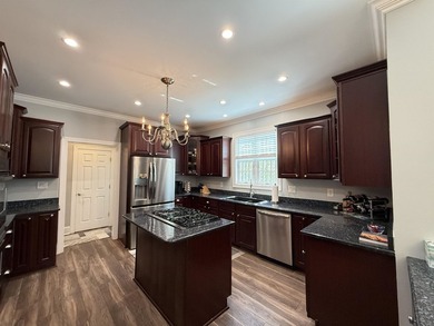 549 Old Augusta Drive is situated within Pawleys Plantation; a on Pawleys Plantation Golf and Country Club in South Carolina - for sale on GolfHomes.com, golf home, golf lot