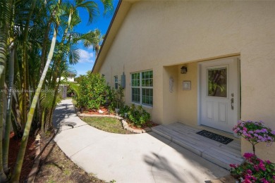 Find paradise in this elegantly updated, bright & airy 2bed on Delray Beach Golf Club in Florida - for sale on GolfHomes.com, golf home, golf lot