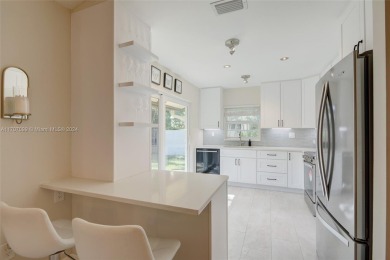 Find paradise in this elegantly updated, bright & airy 2bed on Delray Beach Golf Club in Florida - for sale on GolfHomes.com, golf home, golf lot