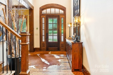 Discover Luxury Mountain Living at 23 Dividing Ridge. Step into on The Cliffs At Walnut Cove in North Carolina - for sale on GolfHomes.com, golf home, golf lot