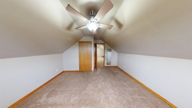 The home at 207 Redwood Drive is located near the Crystal Beach on Woodward Municipal Golf Course in Oklahoma - for sale on GolfHomes.com, golf home, golf lot