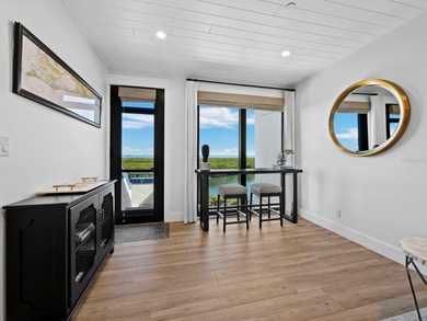 Welcome to a masterfully reimagined two-bedroom, 2.5-bath on Longboat Key Golf Club Resort in Florida - for sale on GolfHomes.com, golf home, golf lot