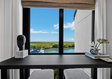 Welcome to a masterfully reimagined two-bedroom, 2.5-bath on Longboat Key Golf Club Resort in Florida - for sale on GolfHomes.com, golf home, golf lot