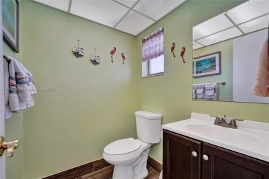 Stunning water & golf course views!  1-bed, 1.5-bath condo in on Sunrise Lakes Phase III in Florida - for sale on GolfHomes.com, golf home, golf lot