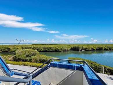Welcome to a masterfully reimagined two-bedroom, 2.5-bath on Longboat Key Golf Club Resort in Florida - for sale on GolfHomes.com, golf home, golf lot