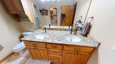 The home at 207 Redwood Drive is located near the Crystal Beach on Woodward Municipal Golf Course in Oklahoma - for sale on GolfHomes.com, golf home, golf lot