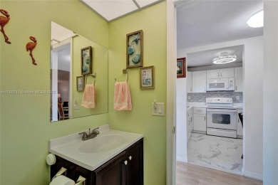 Stunning water & golf course views!  1-bed, 1.5-bath condo in on Sunrise Lakes Phase III in Florida - for sale on GolfHomes.com, golf home, golf lot