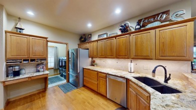 The home at 207 Redwood Drive is located near the Crystal Beach on Woodward Municipal Golf Course in Oklahoma - for sale on GolfHomes.com, golf home, golf lot