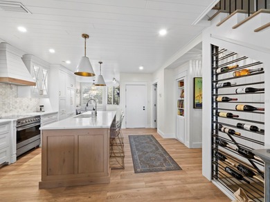 Welcome to a masterfully reimagined two-bedroom, 2.5-bath on Longboat Key Golf Club Resort in Florida - for sale on GolfHomes.com, golf home, golf lot