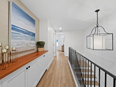 Welcome to a masterfully reimagined two-bedroom, 2.5-bath on Longboat Key Golf Club Resort in Florida - for sale on GolfHomes.com, golf home, golf lot