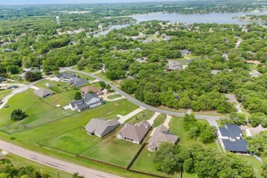 Welcome to this stunning custom-built home tucked inside the on Lake Kiowa Golf Course in Texas - for sale on GolfHomes.com, golf home, golf lot