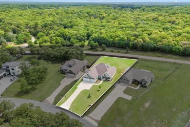 Welcome to this stunning custom-built home tucked inside the on Lake Kiowa Golf Course in Texas - for sale on GolfHomes.com, golf home, golf lot