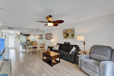 Stunning water & golf course views!  1-bed, 1.5-bath condo in on Sunrise Lakes Phase III in Florida - for sale on GolfHomes.com, golf home, golf lot