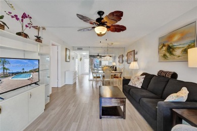 Stunning water & golf course views!  1-bed, 1.5-bath condo in on Sunrise Lakes Phase III in Florida - for sale on GolfHomes.com, golf home, golf lot