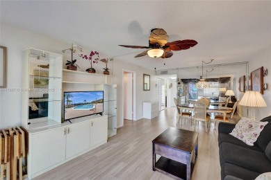 Stunning water & golf course views!  1-bed, 1.5-bath condo in on Sunrise Lakes Phase III in Florida - for sale on GolfHomes.com, golf home, golf lot