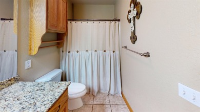 The home at 207 Redwood Drive is located near the Crystal Beach on Woodward Municipal Golf Course in Oklahoma - for sale on GolfHomes.com, golf home, golf lot