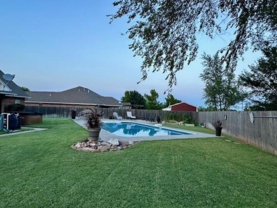 The home at 207 Redwood Drive is located near the Crystal Beach on Woodward Municipal Golf Course in Oklahoma - for sale on GolfHomes.com, golf home, golf lot