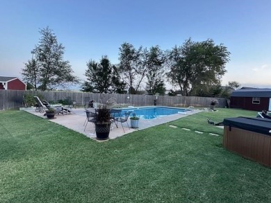 The home at 207 Redwood Drive is located near the Crystal Beach on Woodward Municipal Golf Course in Oklahoma - for sale on GolfHomes.com, golf home, golf lot