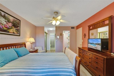 Stunning water & golf course views!  1-bed, 1.5-bath condo in on Sunrise Lakes Phase III in Florida - for sale on GolfHomes.com, golf home, golf lot