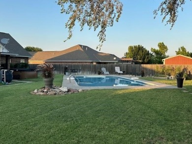 The home at 207 Redwood Drive is located near the Crystal Beach on Woodward Municipal Golf Course in Oklahoma - for sale on GolfHomes.com, golf home, golf lot