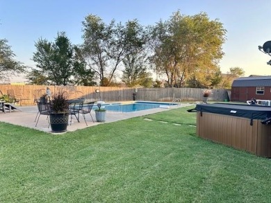 The home at 207 Redwood Drive is located near the Crystal Beach on Woodward Municipal Golf Course in Oklahoma - for sale on GolfHomes.com, golf home, golf lot